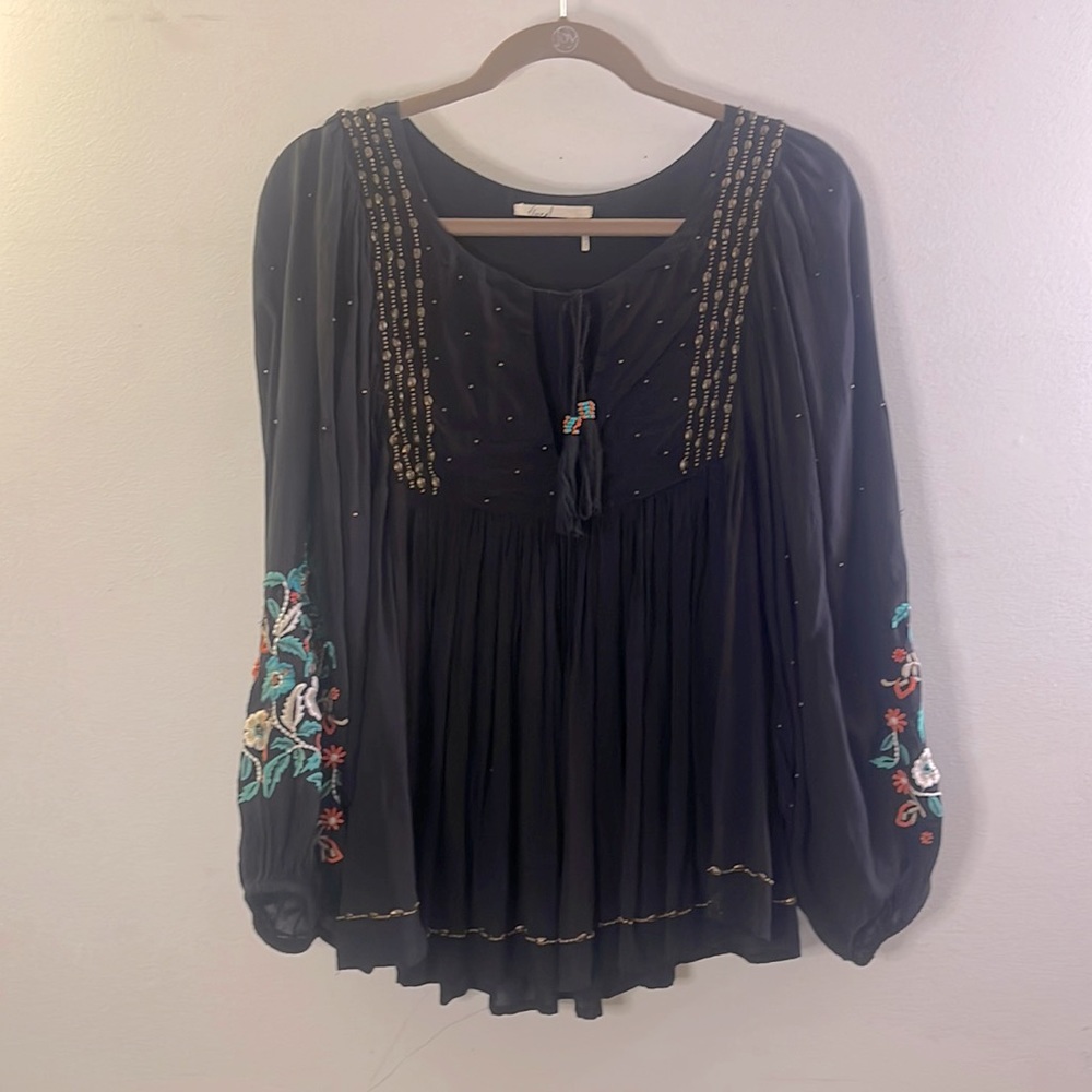 Gorgeous embroidered and beaded top.